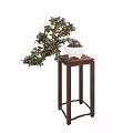 Ornamental Bonsai Plant with Green Leaves and Pink Flowers on Wooden Stand