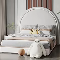 Children's Bed with Arched Headboard Gray Bedding Striped Pillows Yellow Stuffed Toy White Robot Plush