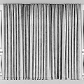 Sheer Lightweight Beige Curtains Filtering Soft Natural Light Through Window Panels