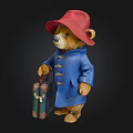 Paddington Bear Character Wearing Red Hat Blue Coat Holding Suitcase