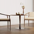 Round Negotiation Table with Two Upholstered Chairs in Minimalist Room Wooden Floor and Decorative Vase