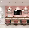 Shopping Mall Nail Salon With Pink Walls Marble Counter Comfortable Pink Chairs And Decorative Paintings