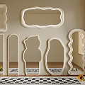 Stylish Mirrors with Various Shapes in Wall Decor for Room with Checkered Rug and Plants