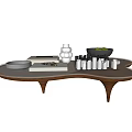Wooden Coffee Table with Unique Design Metal Sculptures Green Vase and Apple Bowl