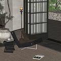 Woven Outdoor Patio Chair With Side Table And Potted Plant