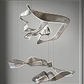 Modern Metallic Twisted Ribbon Chandelier Design for Stylish Contemporary Spaces