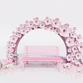 Floral Installation With Pink Flower Arch And Pink Bench With Scattered Petals