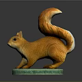 Orange Squirrel Game and Movie Character With Fluffy Tail On Green Base Statue