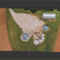 Aerial View Of Rural Farm With Multiple Silos Red Barn Green Grass And Trees