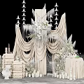 Elegant Wedding Photo Spot With White Drapery Decorative Chandeliers Fresh Flowers Candles And Cake Tower
