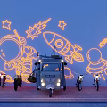 Vintage Motorcycles and Tricycle Display with Cartoon Astronaut Rocket Stars Wall