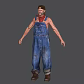Man In Blue Denim Overalls With Distressed Details Standing Against Gray Background