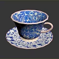Blue and White Porcelain Teacup with Saucer Featuring Decorative Floral Patterns