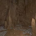 Natural Cave Interior Featuring Stalactites Stalagmites Rock Walls And Rocky Ground