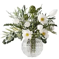 White Flowers in Transparent Textured Glass Vase with Green Leaves and Foliage