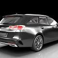 Black Kia Station Wagon With Sleek Design And Sporty Alloy Wheels