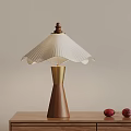 Elegant Table Lamp With White Scalloped Lampshade Wooden Conical Base Golden Accent And Red Fruits