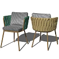 Modern Green and Gold Dining Chairs With Woven Backrests Gray Cushions and Metal Legs
