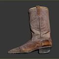 Brown Leather Cowboy Boots With Worn Out Details Aged Sole And Dark Background Reflection