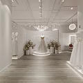 Bright White Wedding Dress Shop Corridor With Wall Mounted Bridal Photos And Reception Desk