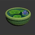 Pink Lotus Flower And Green Lily Pads In Green Patterned Bowl On Water Surface