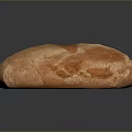 Freshly Baked Artisan Bread With Golden Crusty Exterior And Soft Interior