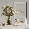 Transparent Vase With White And Light Pink Flowers Green Leaves Macarons Notepad And Wall Art