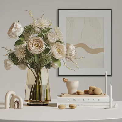 Transparent Vase With White And Light Pink Flowers Green Leaves Macarons Notepad And Wall Art 3d model