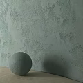 Decorative Gray Spherical Component On Light Green Textured Wall Surface