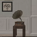 Vintage Phonograph And Framed Artwork In Classic Interior With Paneled Wall And Lamp