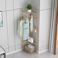 Gold Metal Clothes Rack With Hanging Clothes And Handbags Storage Basket In Modern Bedroom Interior
