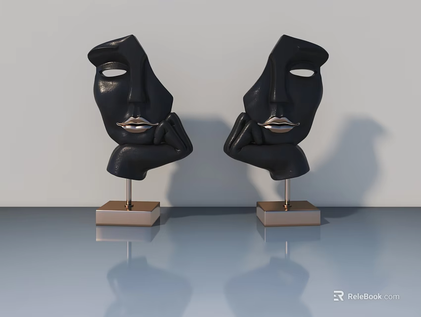 Two Black Abstract Face Sculptures On Metal Bases With Reflective Table Surface 3d model 
