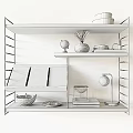 Decorative Ornaments Set on Modern White Shelves with Glass Globe Vase Books and Table Lamp