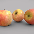 Fresh Ripe Red and Yellow Apples With Juicy Shiny Texture And Three Fruits