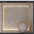 Round Sculpture in Minimalist Modern Style with Light-Colored Wall and Recessed Lighting