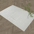White Square Rug With Wavy Texture On Wooden Floor Beside Green Plant Vase