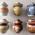 Traditional Ceramic Jars Featuring Colorful Hand Painted Patterns And Lids 3d model
