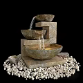Garden Water Fountain Stone Tiered Design With Water Flowing Between Bowls Surrounded By Pebbles