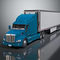 Blue Semi Truck With White Trailer And Shiny Exterior On Gray Surface