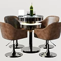 Contemporary Round Table and Brown Leather Chair Set with Metal Frame and Green Bottle