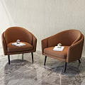 Brown Upholstered Single Chairs With Book And Silver Sphere On Light Wall Marble Floor