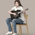 A Woman sitting on wooden chair playing acoustic guitar wearing white T-shirt and blue jeans