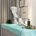 Dining Table With Turquoise Tablecloth White Sculpture Vase Olive Bottle Fruit Fish Green Plant Wall Paintings