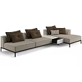 Beige Sectional Sofa With Brown Striped Pillows And Modern Metal Frame Design