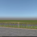 Decorative Metal Railing On Wooden Deck With Green Grassland And Blue Sky