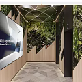 Elevator Lobby Featuring Green Plant Wall Display Screen Wooden Decor And Geometric Ceiling