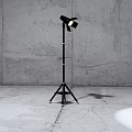 Modern Black Floor Lamp With Tripod Base Adjustable Head And Gray Concrete Wall