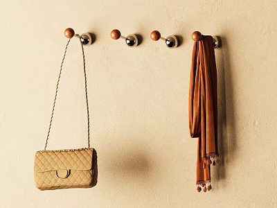 Decorative Metal Hooks With Beige Handbag And Brown Scarf On Beige Wall 3d model