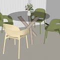 Modern Table and Chair Set with Round Glass Top Crossed Legs and Green Beige Chairs