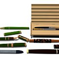 Various Styles of Pens with Open Wooden Pen Case and Multi Color Designs